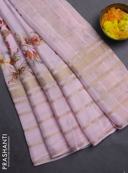 Semi georgette saree baby pink with allover floral prints and long zari woven border