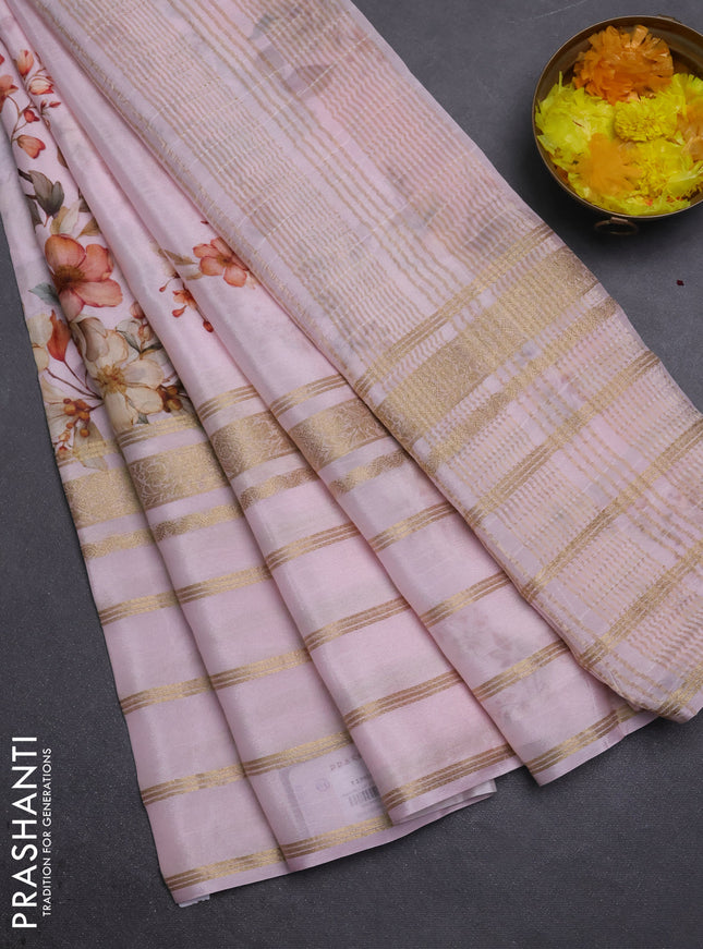 Semi georgette saree baby pink with allover floral prints and long zari woven border