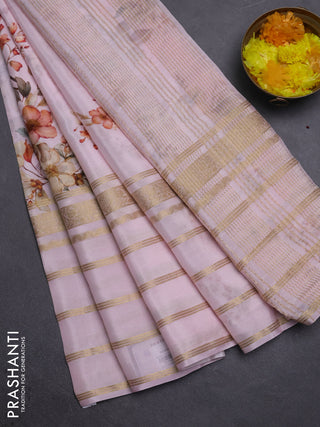 Semi georgette saree baby pink with allover floral prints and long zari woven border