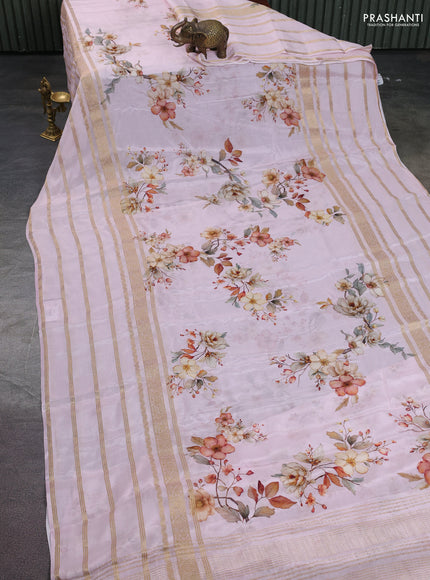 Semi georgette saree baby pink with allover floral prints and long zari woven border