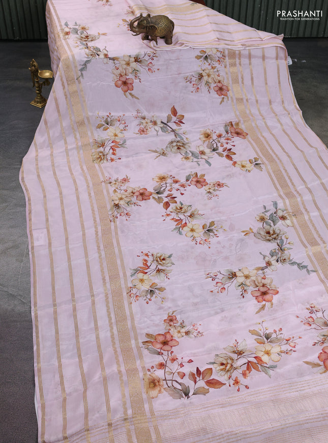 Semi georgette saree baby pink with allover floral prints and long zari woven border