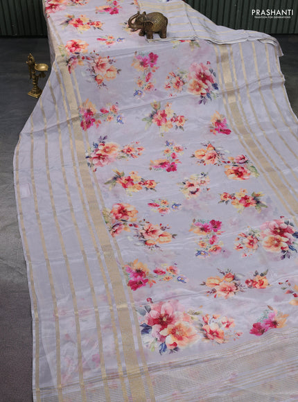 Semi georgette saree grey with allover floral prints and long zari woven border