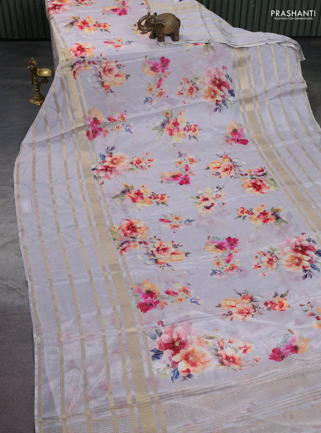 Semi georgette saree grey with allover floral prints and long zari woven border