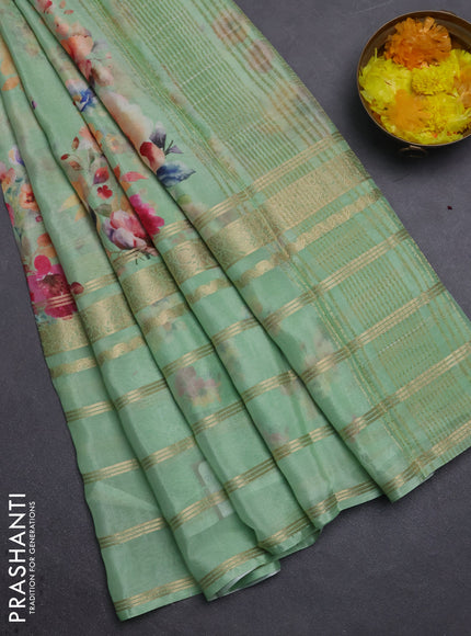 Semi georgette saree green with allover floral prints and long zari woven border