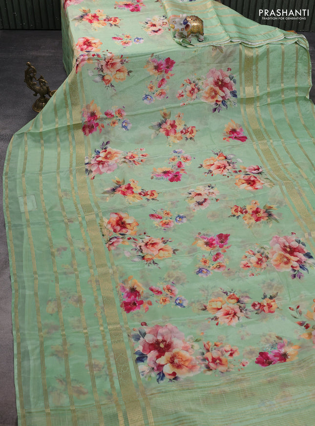 Semi georgette saree green with allover floral prints and long zari woven border