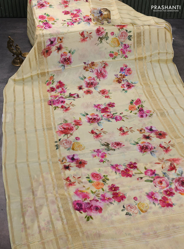 Semi georgette saree pale yellow with allover floral prints and long zari woven border