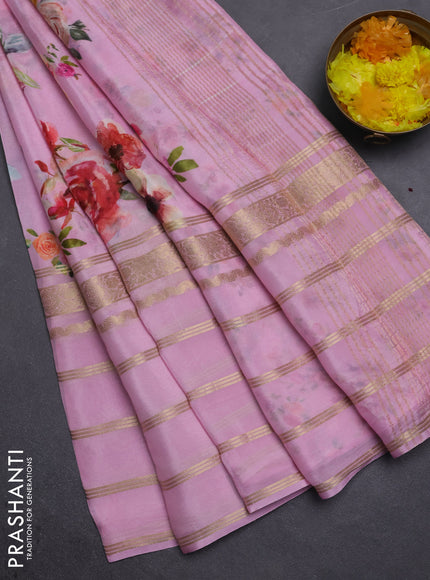 Semi georgette saree light pink with allover floral prints and long zari woven border