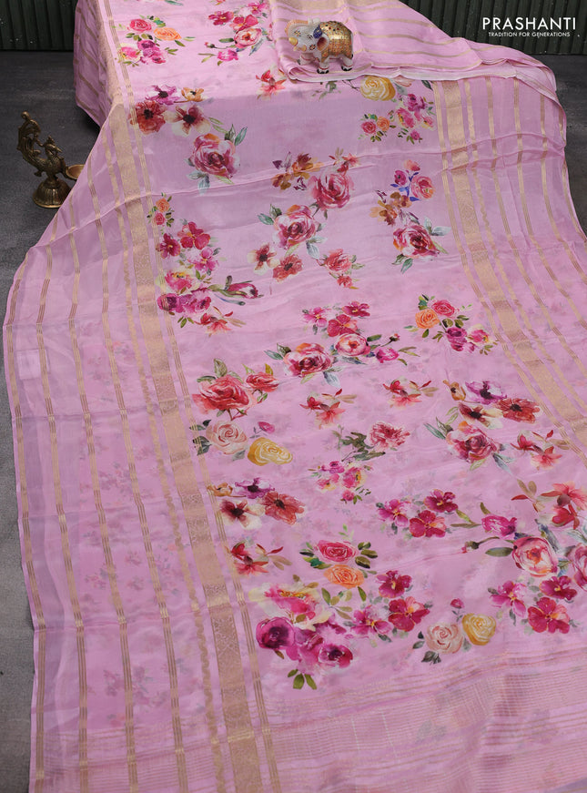 Semi georgette saree light pink with allover floral prints and long zari woven border