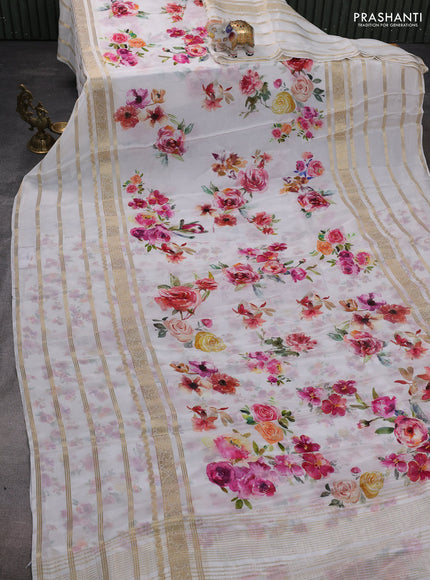 Semi georgette saree off white with allover floral prints and long zari woven border