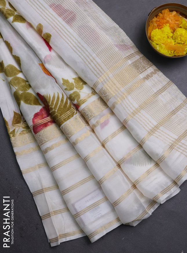 Semi georgette saree off white with allover floral prints and long zari woven border