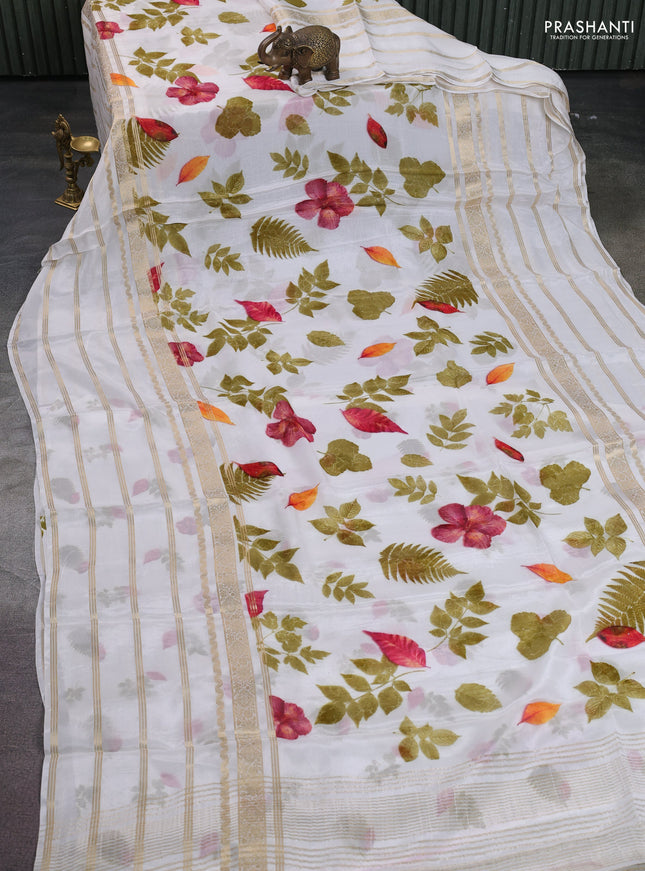 Semi georgette saree off white with allover floral prints and long zari woven border