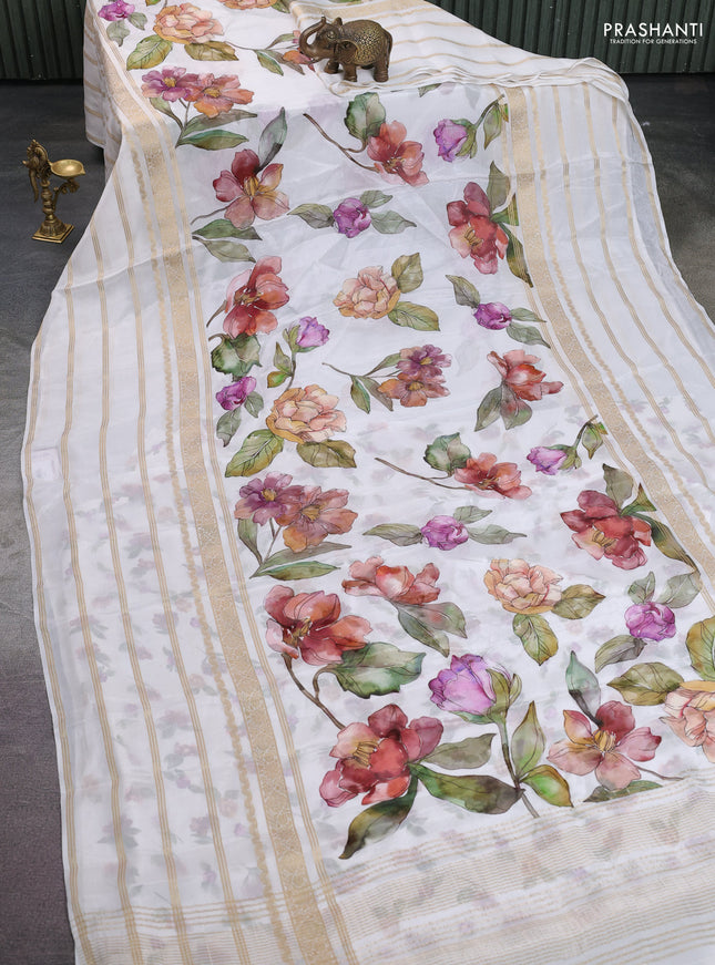 Semi georgette saree off white with allover floral prints and long zari woven border
