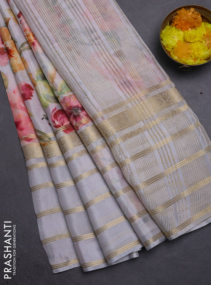 Semi georgette saree pastel grey with allover floral prints and long zari woven border