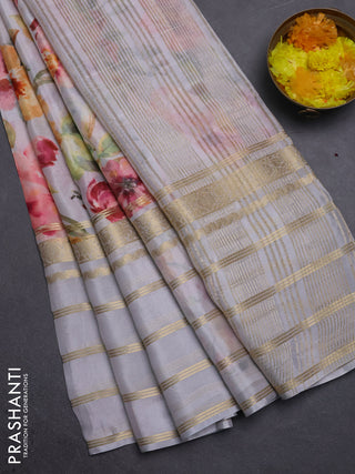 Semi georgette saree pastel grey with allover floral prints and long zari woven border