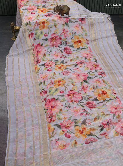Semi georgette saree pastel grey with allover floral prints and long zari woven border