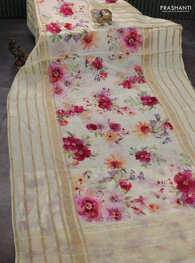 Semi georgette saree pale yellow with allover floral prints and long zari woven border