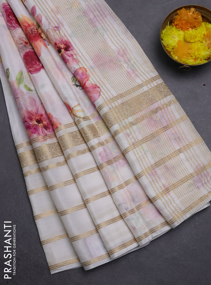 Semi georgette saree off white with allover floral prints and long zari woven border
