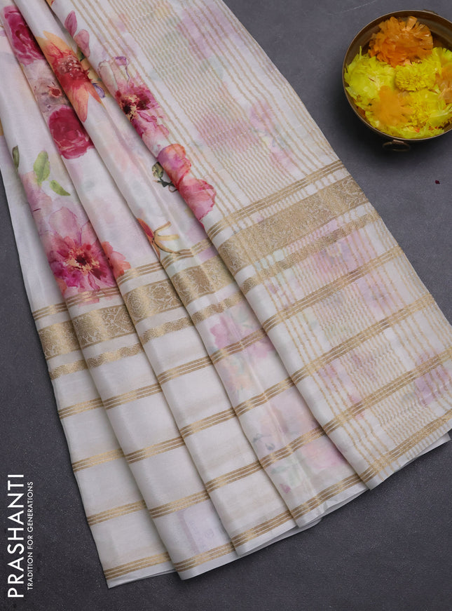 Semi georgette saree off white with allover floral prints and long zari woven border