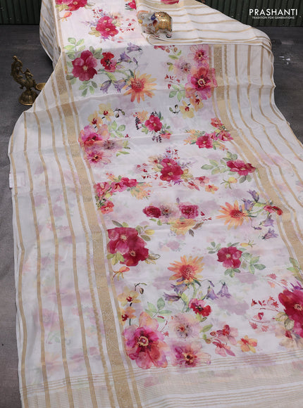 Semi georgette saree off white with allover floral prints and long zari woven border
