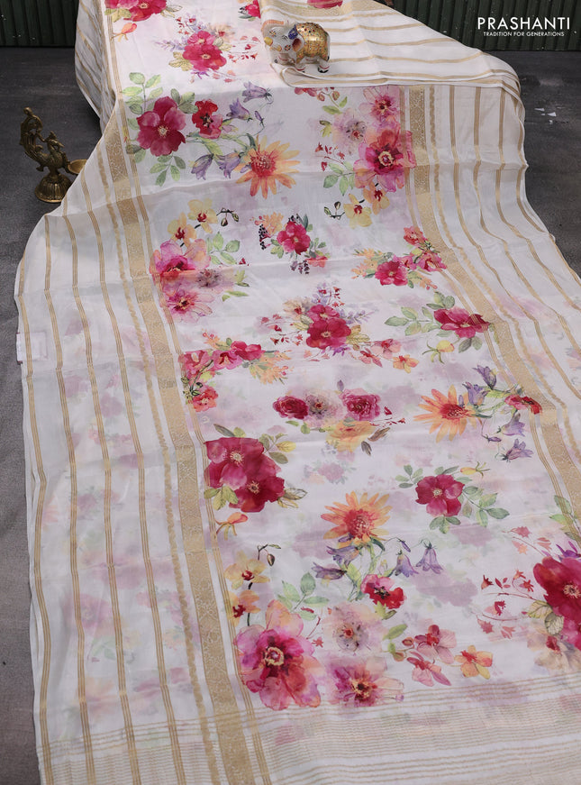 Semi georgette saree off white with allover floral prints and long zari woven border