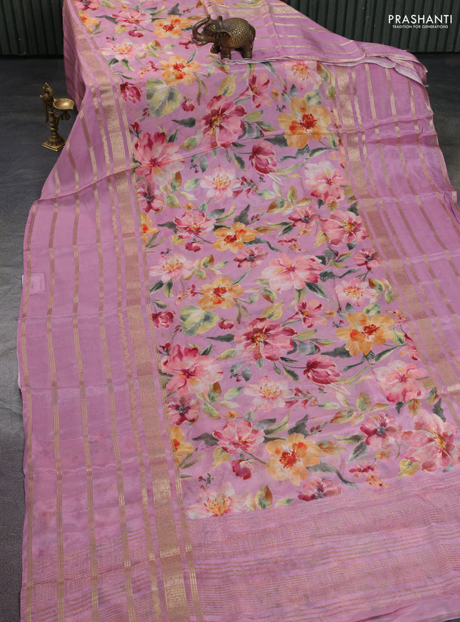 Semi georgette saree mauve pink with allover floral prints and long zari woven border