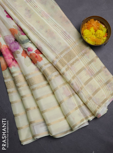 Semi georgette saree lime yellow with allover floral prints and long zari woven border