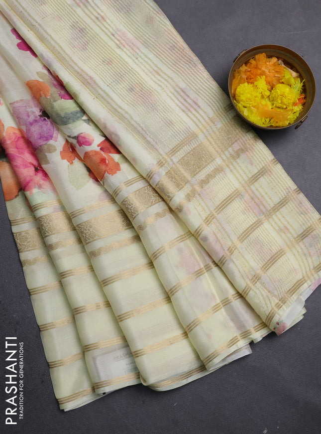 Semi georgette saree lime yellow with allover floral prints and long zari woven border