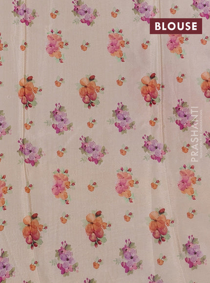 Semi georgette saree pale orange with allover floral prints and long zari woven border
