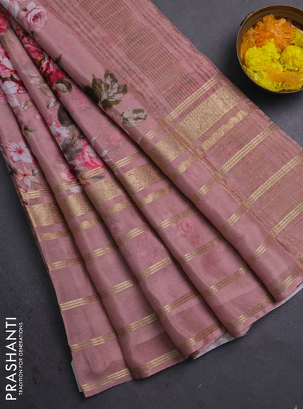 Semi georgette saree pastel peach pink with allover floral prints and long zari woven border