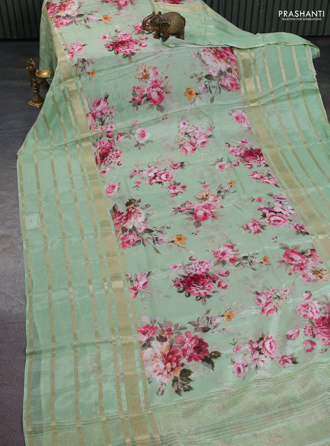Semi georgette saree green with allover floral prints and long zari woven border