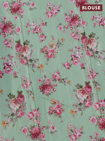 Semi georgette saree green with allover floral prints and long zari woven border