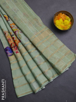Semi georgette saree pastel green with allover floral prints and long zari woven border
