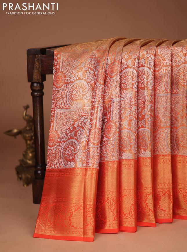 Pure kanchipuram tissue silk saree orange with allover silver zari woven brocade weaves and zari woven border