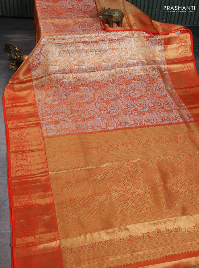 Pure kanchipuram tissue silk saree orange with allover silver zari woven brocade weaves and zari woven border