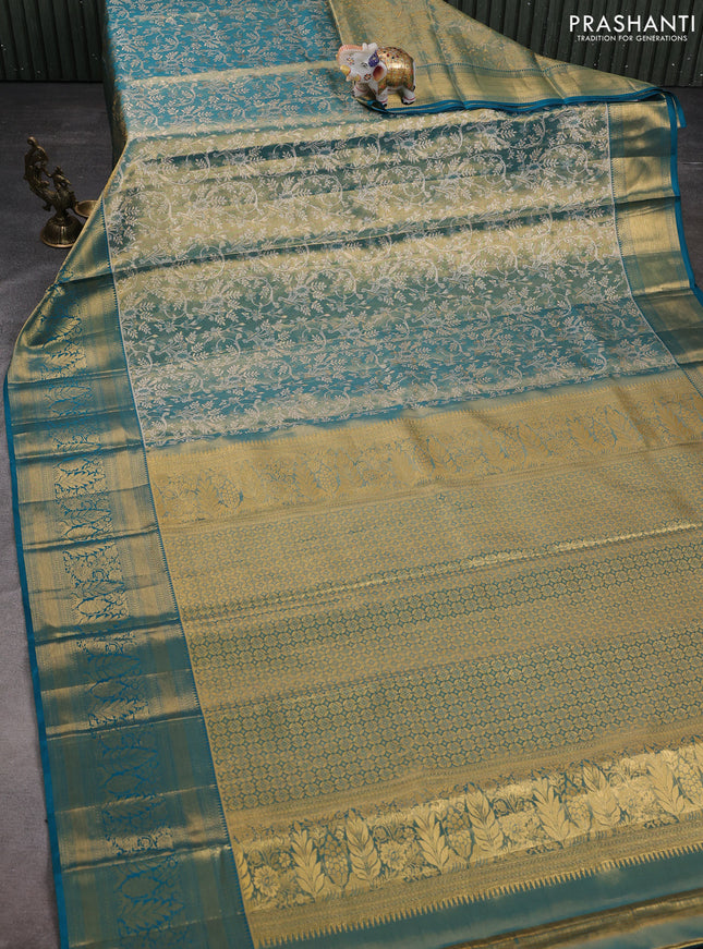 Pure kanchipuram tissue silk saree dual shade of cs blue with allover zari woven brocade weaves and zari woven border