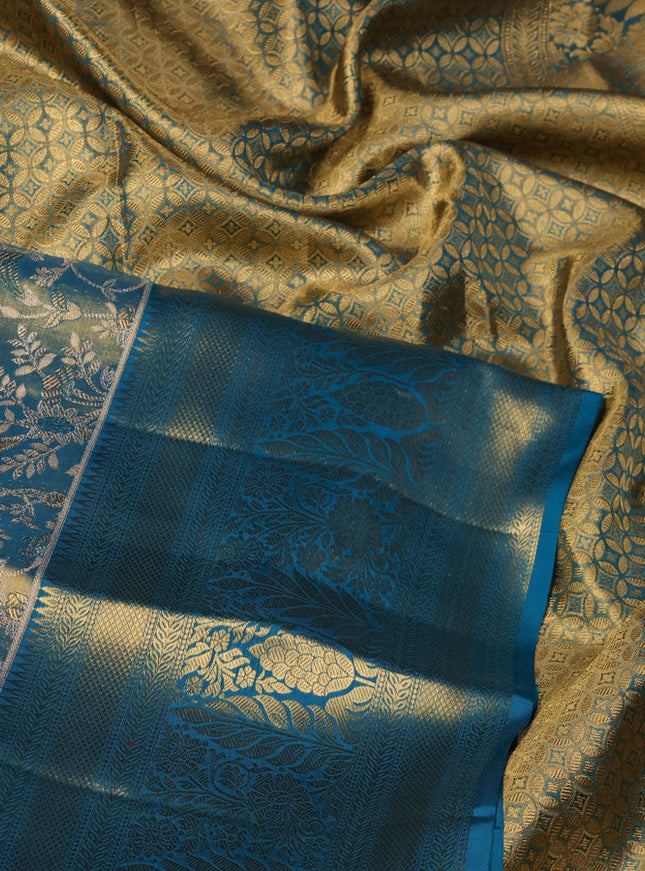 Pure kanchipuram tissue silk saree dual shade of cs blue with allover zari woven brocade weaves and zari woven border