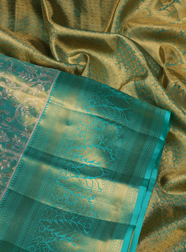 Pure kanchipuram tissue silk saree teal green with allover silver zari woven brocade weaves and zari woven border