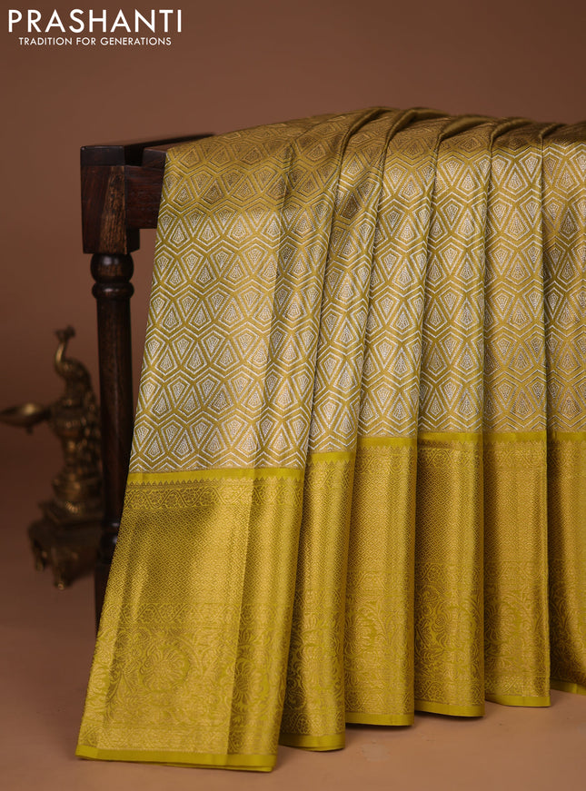 Pure kanchipuram tissue silk saree lime yellow with allover zari woven brocade weaves and zari woven border