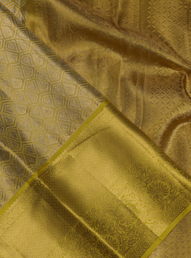Pure kanchipuram tissue silk saree lime yellow with allover zari woven brocade weaves and zari woven border