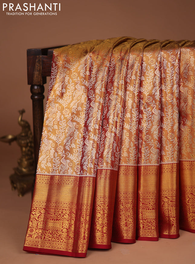 Pure kanchipuram tissue silk saree dual shade of gold and red with allover zari woven brocade weaves and zari woven border