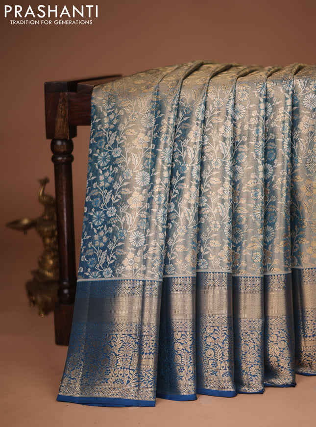 Pure kanchipuram tissue silk saree dual shade of cs blue with allover zari woven brocade weaves and zari woven border