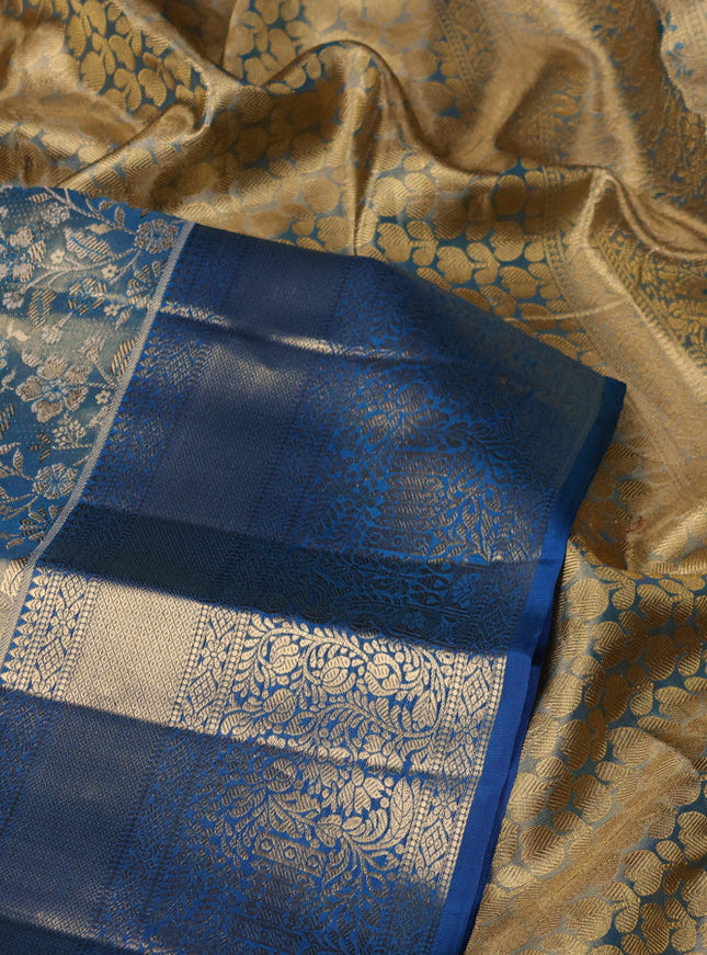 Pure kanchipuram tissue silk saree dual shade of cs blue with allover zari woven brocade weaves and zari woven border