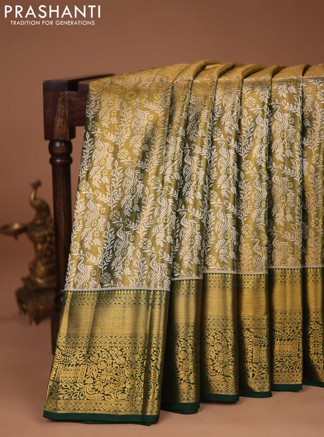 Pure kanchipuram tissue silk saree green with allover silver zari woven brocade weaves and zari woven border