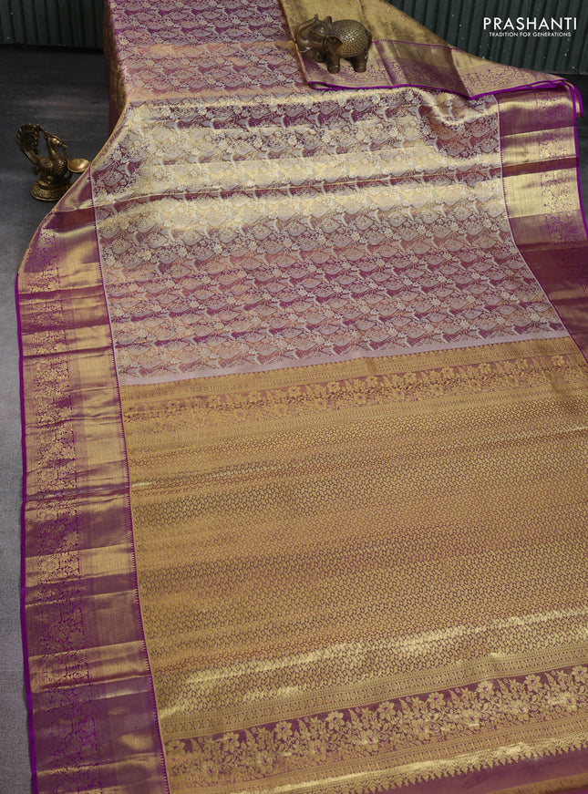 Pure kanchipuram tissue silk saree purple with allover silver zari woven brocade weaves and zari woven border