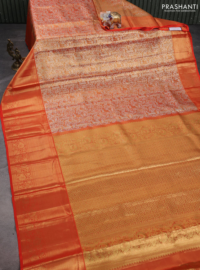 Pure kanchipuram tissue silk saree orange with allover silver zari woven brocade weaves and zari woven border