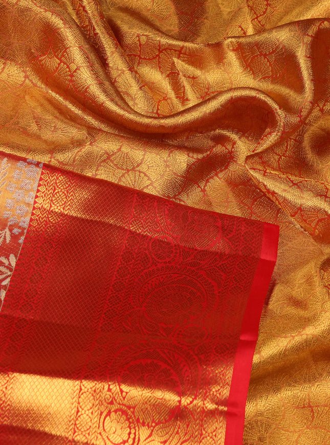 Pure kanchipuram tissue silk saree red shade with allover zari woven brocade weaves and zari woven border