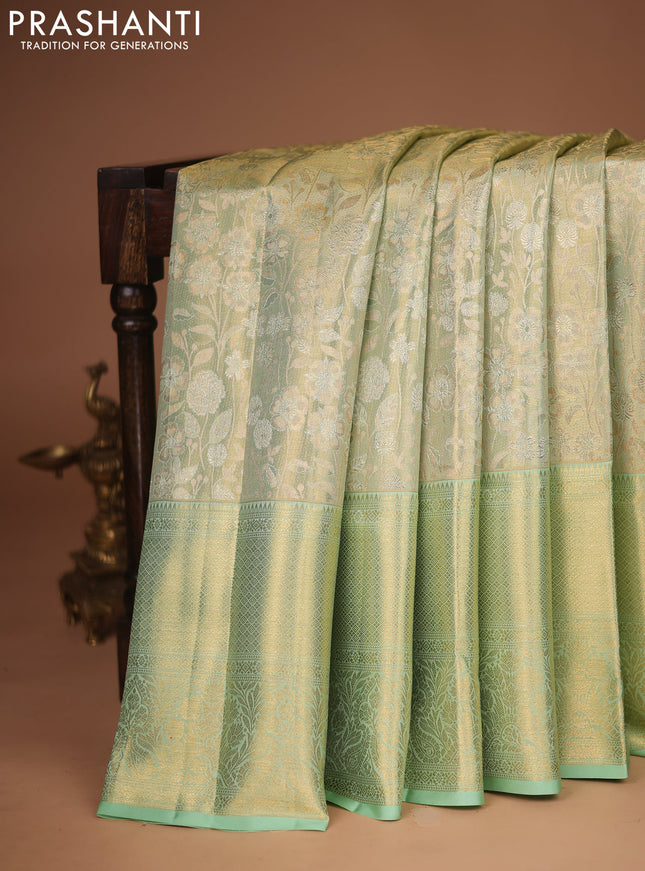 Pure kanchipuram tissue silk saree pista green with allover zari woven brocade weaves and zari woven border