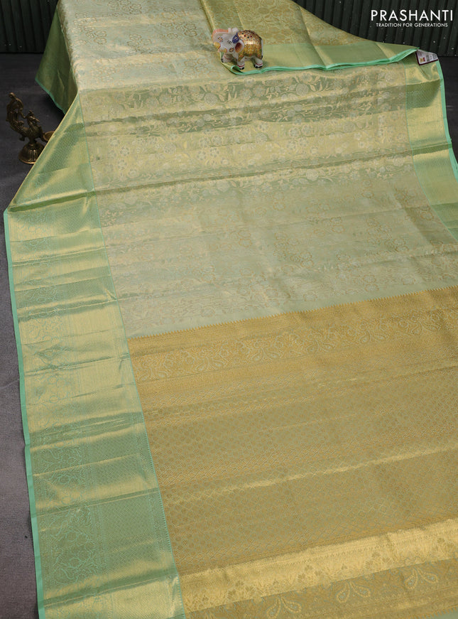 Pure kanchipuram tissue silk saree pista green with allover zari woven brocade weaves and zari woven border