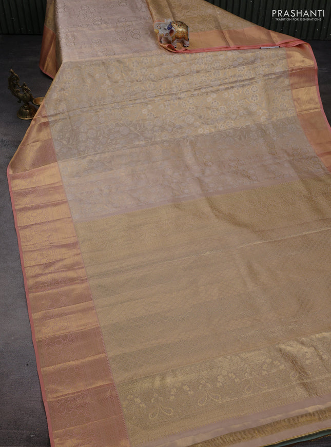 Pure kanchipuram tissue silk saree beige and peach shade with allover zari woven brocade weaves and zari woven border