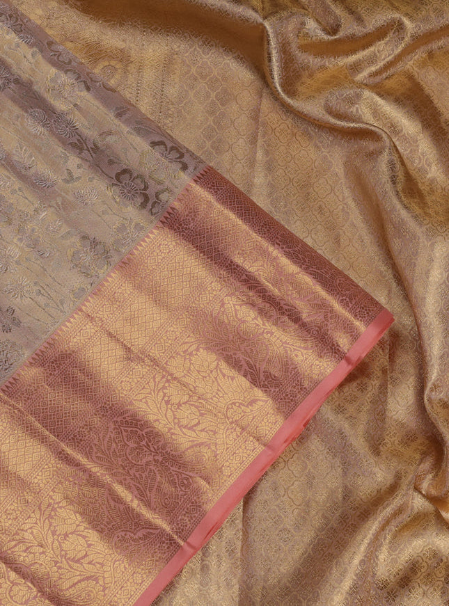 Pure kanchipuram tissue silk saree beige and peach shade with allover zari woven brocade weaves and zari woven border